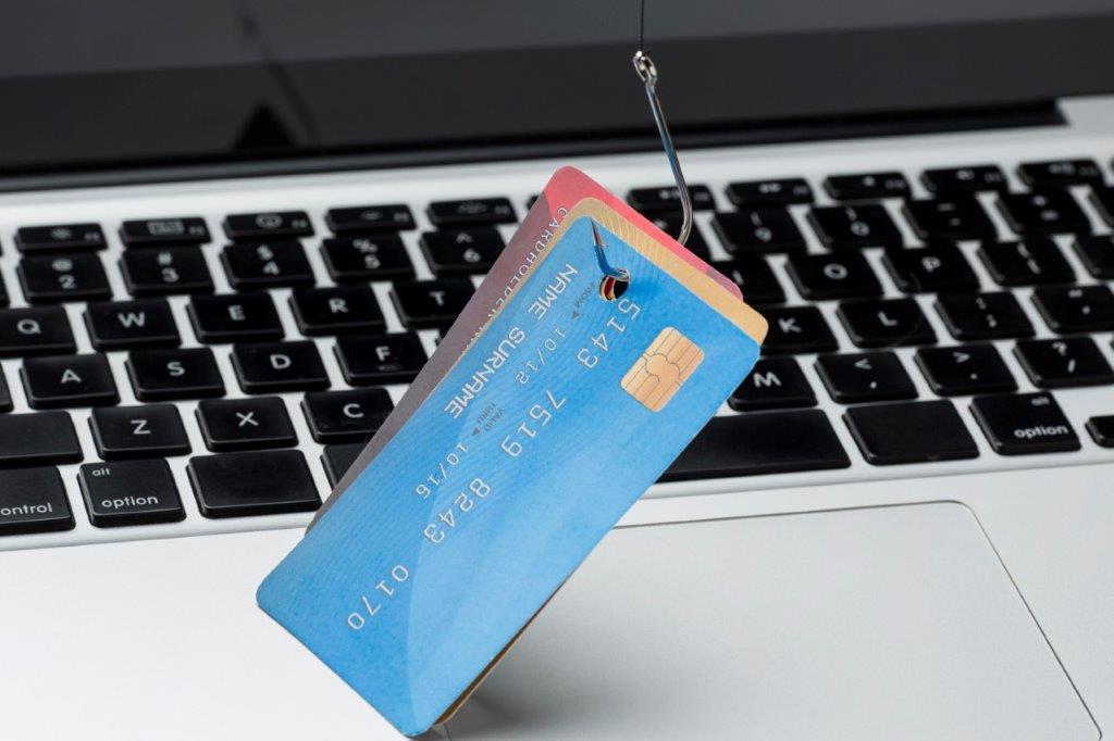 high angle credit card with hook phishing